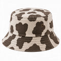 Bob taille unique en tissu beige et marron à motif vache avec œillets